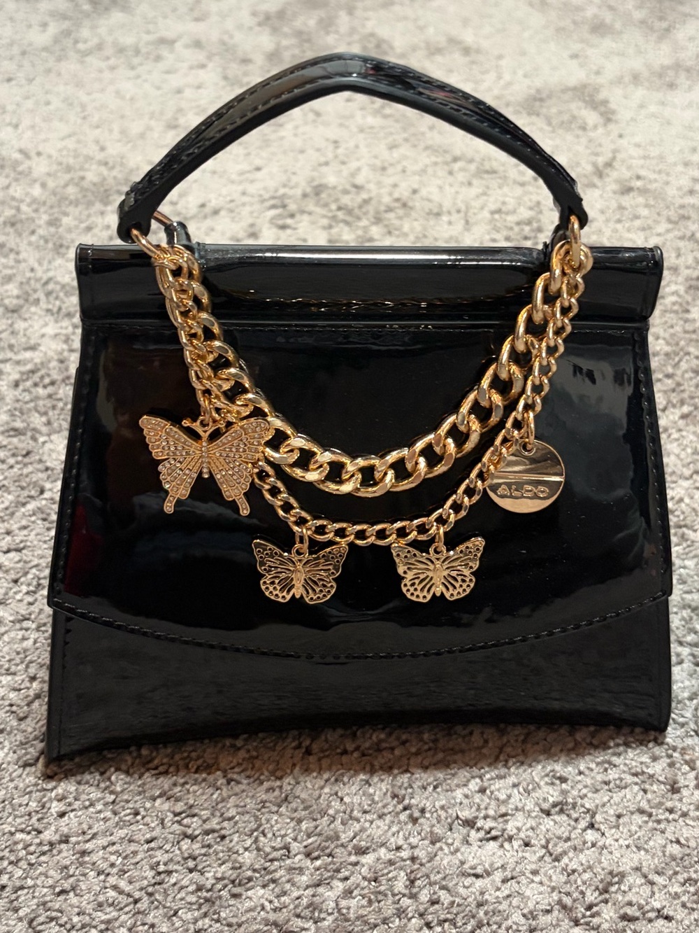 Aldo Black Patent Leather Butterfly Charm Handbag